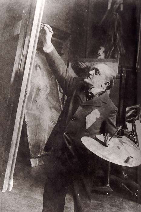 Giovanni  Boldini mentre dipinge